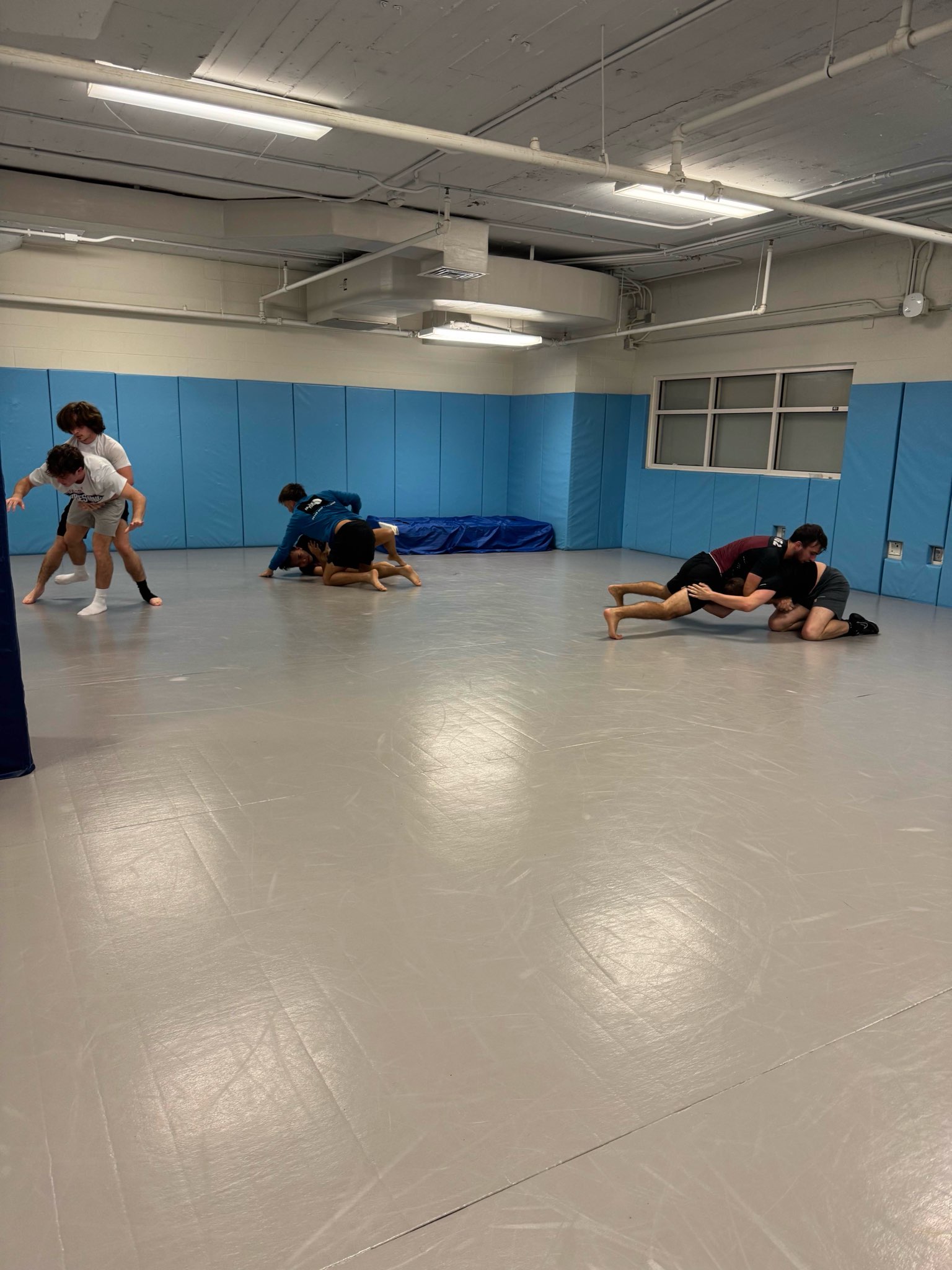 UNC club wrestlers in a live wrestling session.